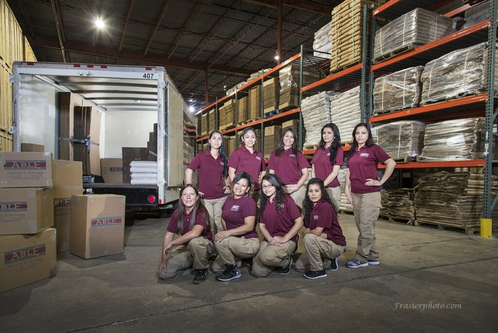 Crew in a warehouse with boxes